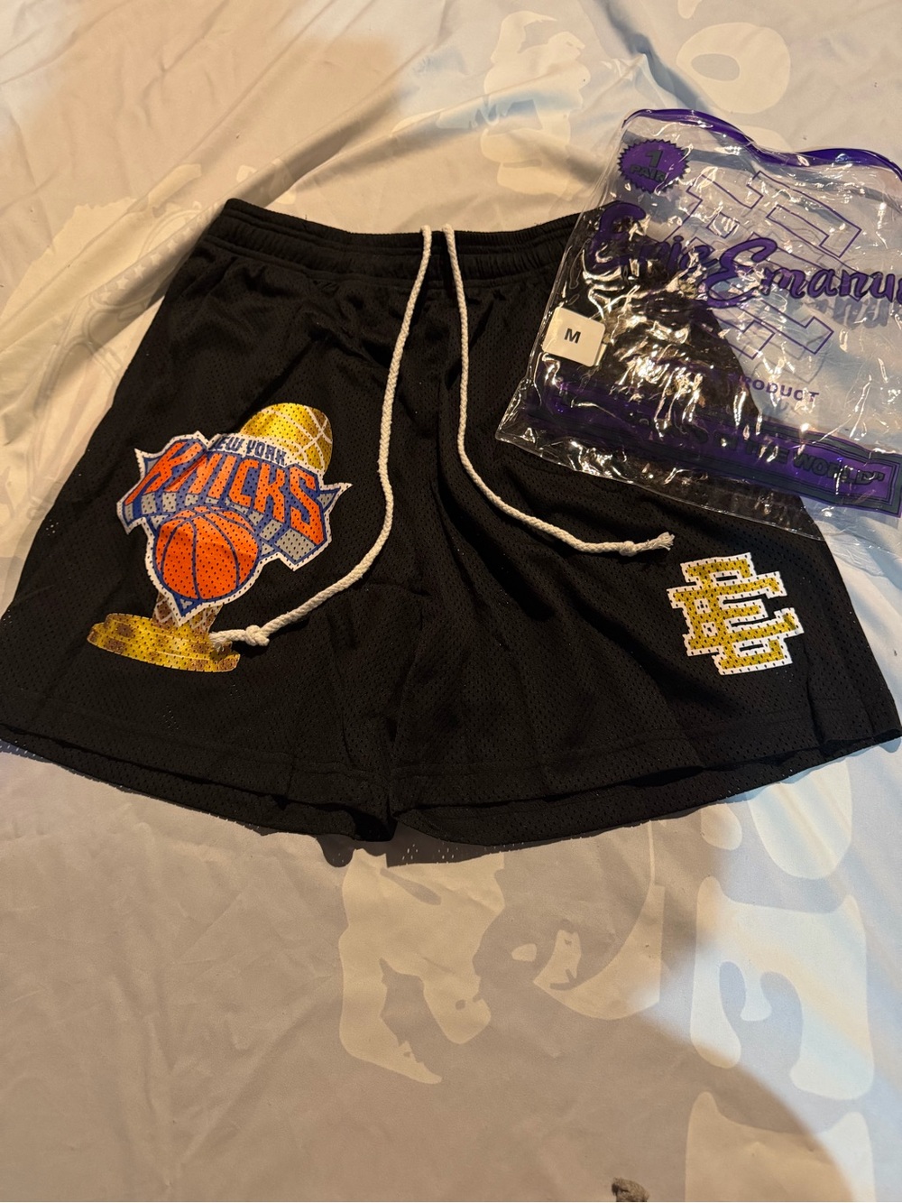 Eric Emanuel Black Knicks Basketball Mesh Shorts with Yellow & Orange Details